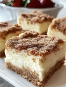 Crowd-Pleasing Snickerdoodle Cheesecake Bars — the ultimate dessert mashup