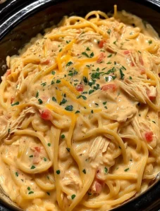 Creamy crockpot chicken spaghetti.